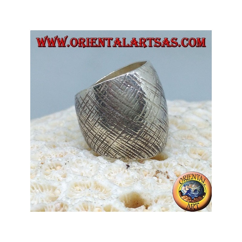 Silver ring with curved band with handmade crossed stripes