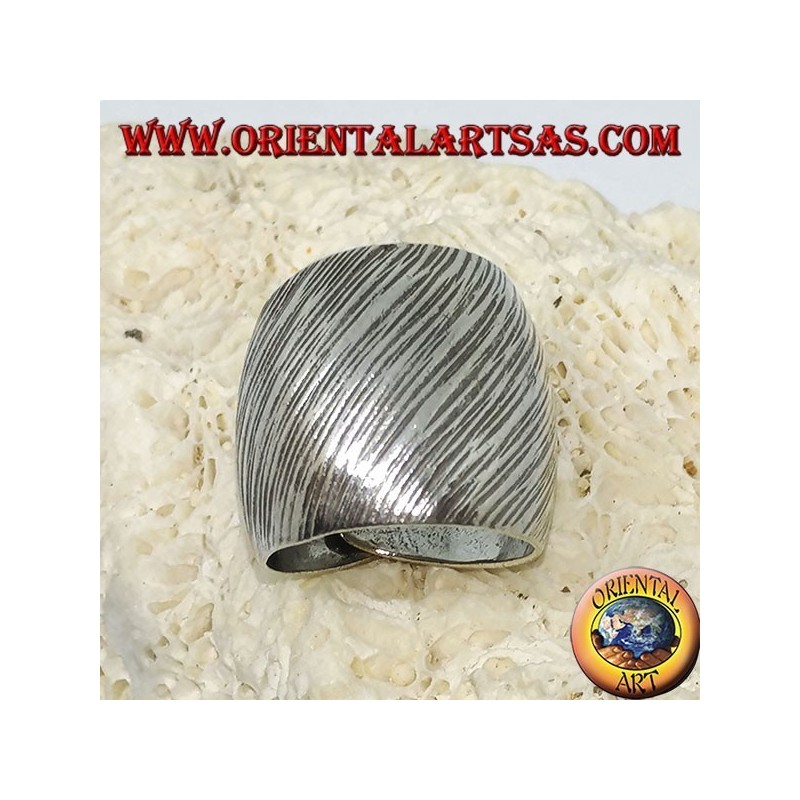 Silver ring with curved band with handmade transversal strip engravings