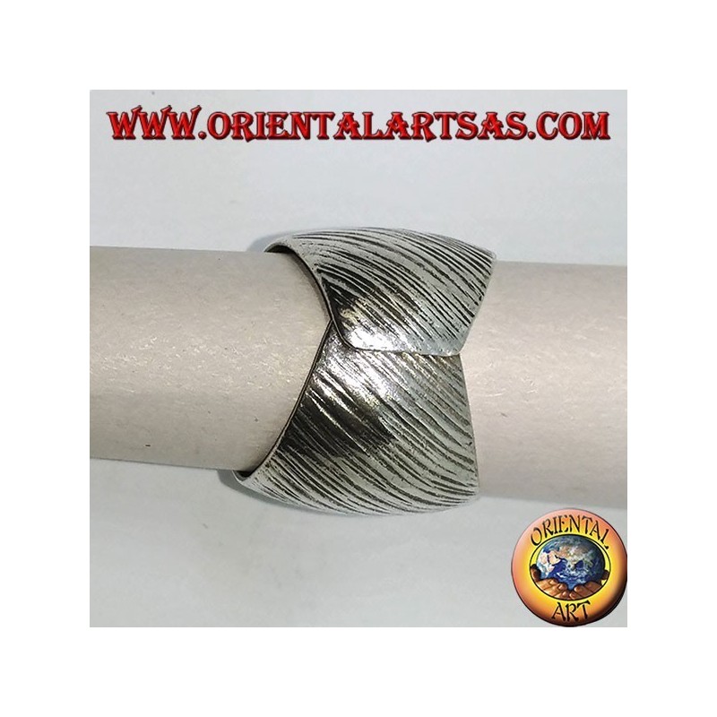 Silver ring with curved band with handmade transversal strip engravings