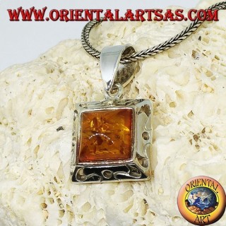 Silver pendant with a square amber and carved edge