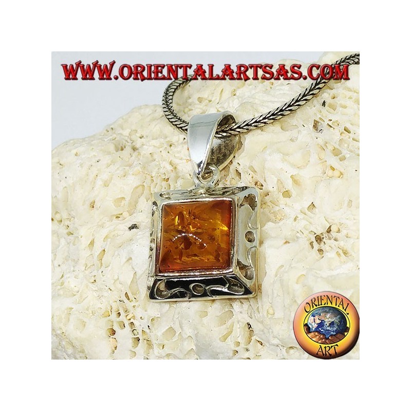 Silver pendant with a square amber and carved edge