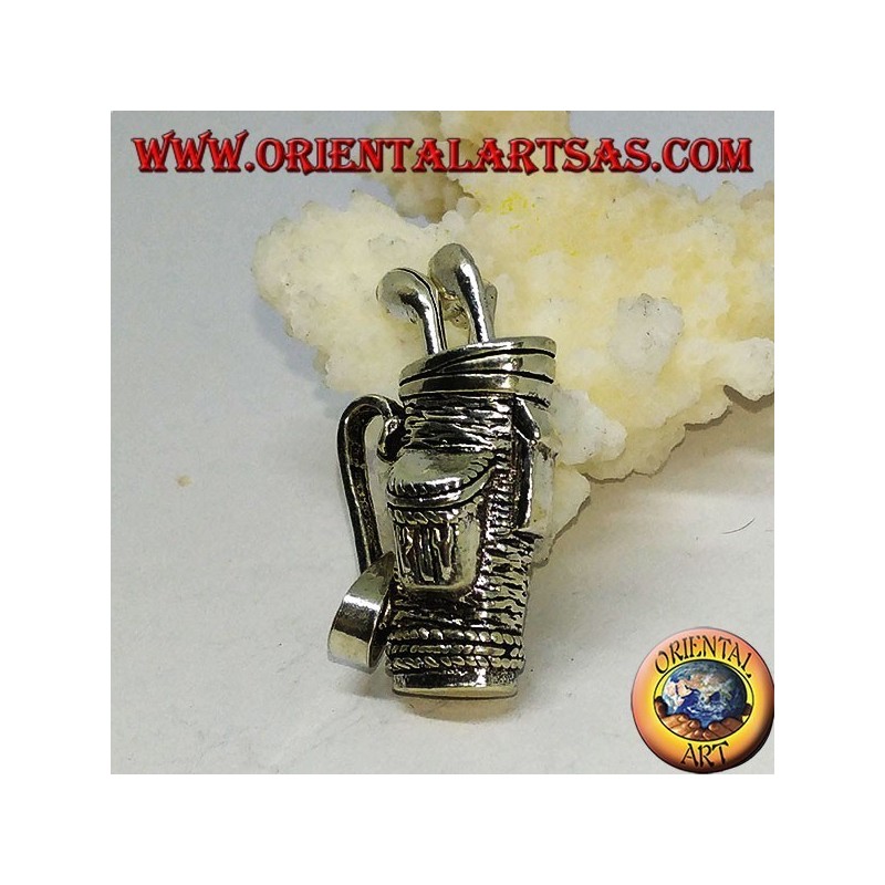 Silver pendant, golf bag with clubs