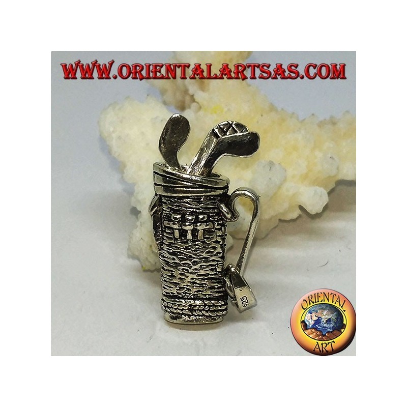 Silver pendant, golf bag with clubs