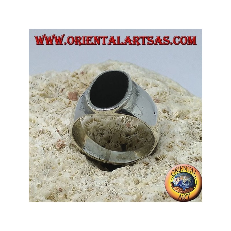 Silver ring with flat oval onyx flush with the edge