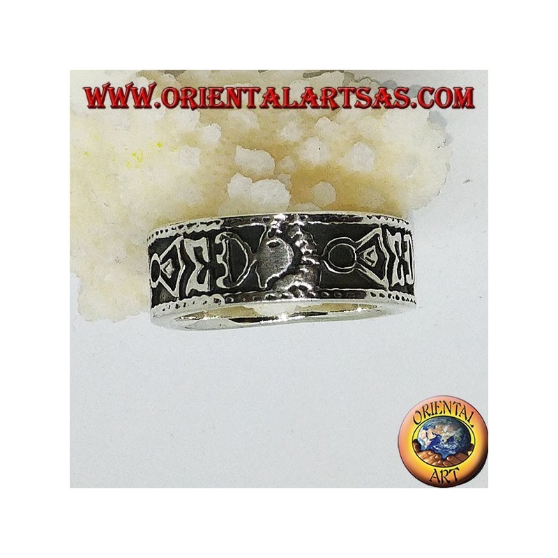Silver band ring with Maori bas-relief designs