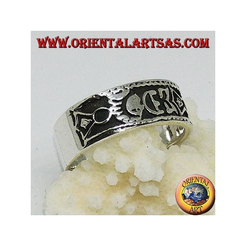 Silver band ring with Maori bas-relief designs