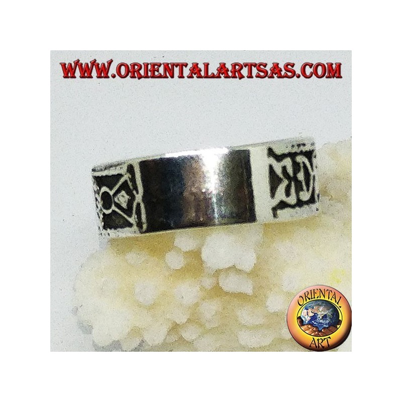 Silver band ring with Maori bas-relief designs