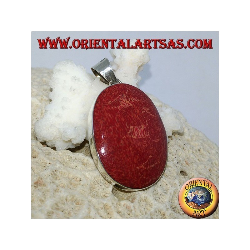 Silver pendant with oval red madrepora