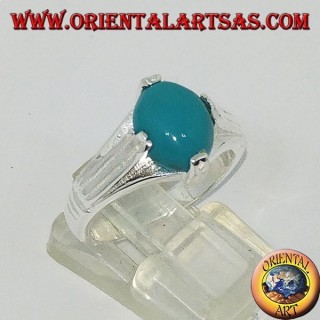 Anillo de plata con turquesa ovalada en cuatro puntos.