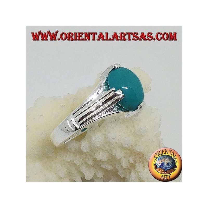 Anillo de plata con turquesa ovalada en cuatro puntos.