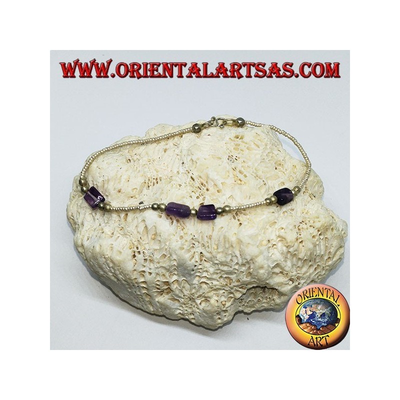 Bracelet strung with silver balls and tumbled amethyst pieces