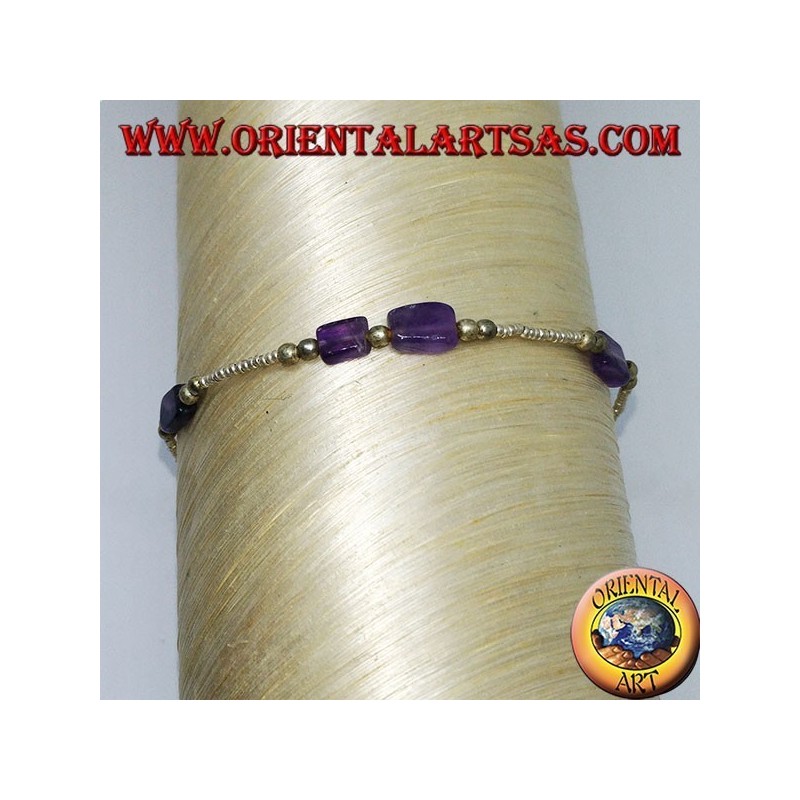 Bracelet strung with silver balls and tumbled amethyst pieces