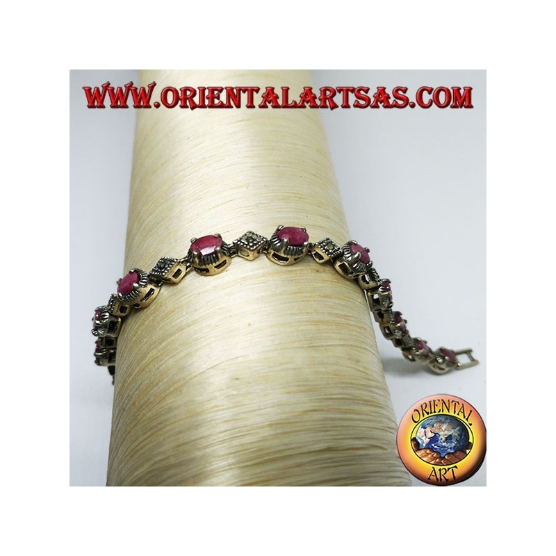 Bracciali in argento con 12 rubini ovali  incastonati da 4 griffe, e marcasite