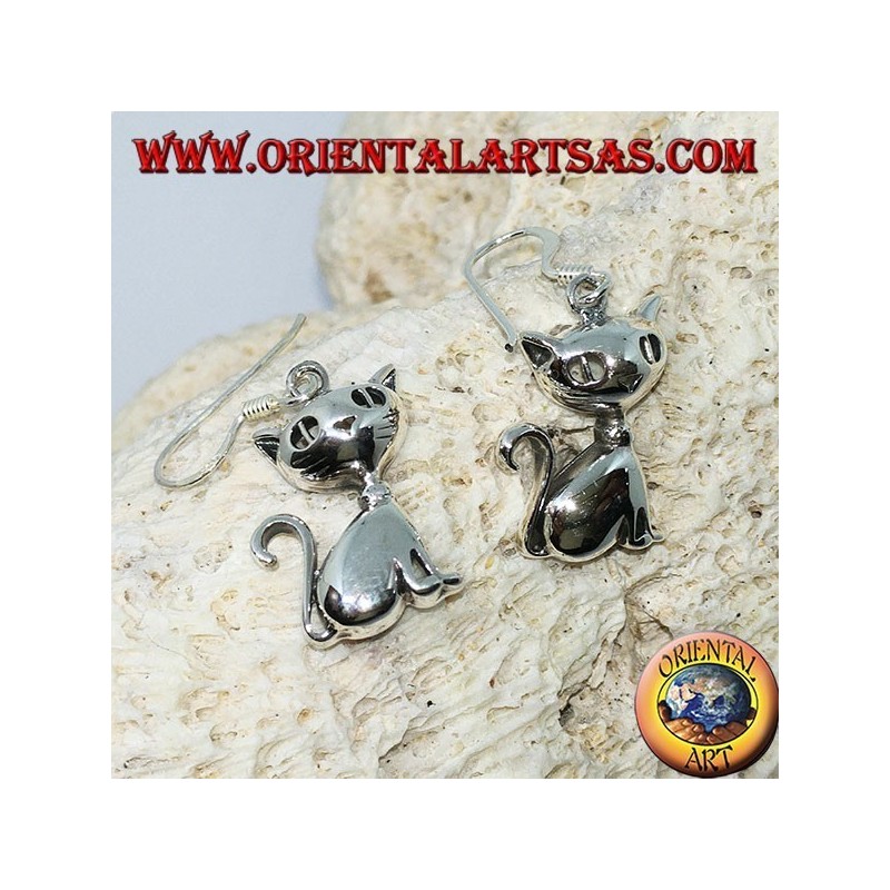 Silver earrings in the shape of a sitting cat