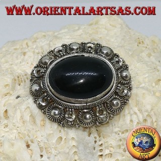 Handmade silver brooch with oval onyx