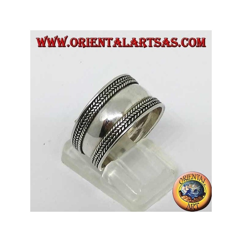 Wide silver ring with braids on the edges, Bali