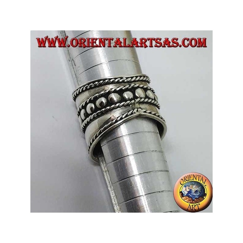 Wide band ring in silver with central studs, Bali