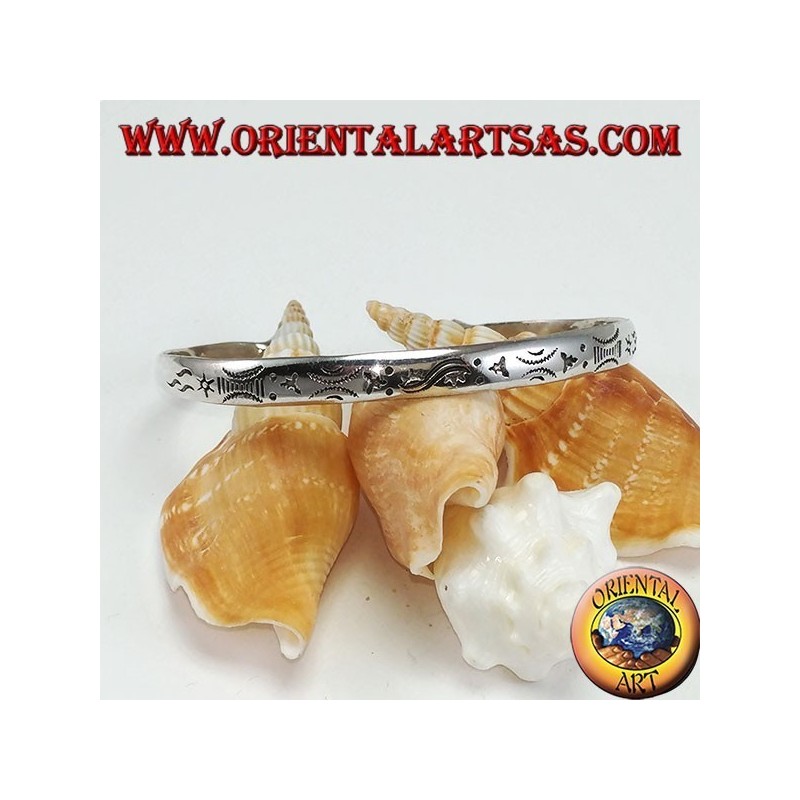 Rigid bracelet in silver, with handmade dawn and sunset engravings