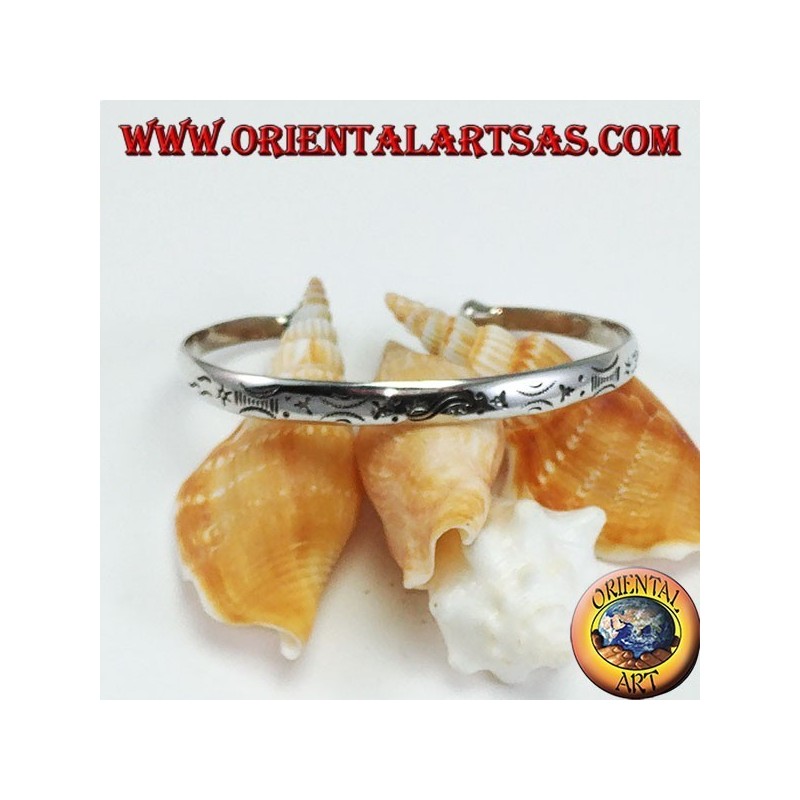 Rigid bracelet in silver, with handmade dawn and sunset engravings