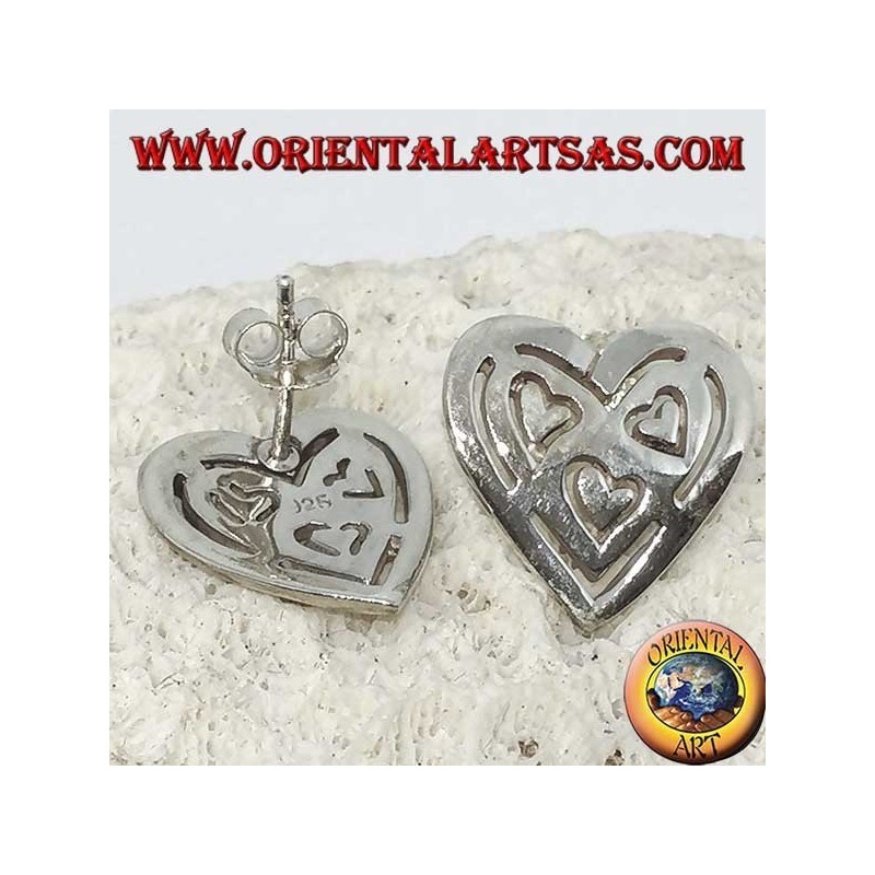 Silver lobe earrings in pierced heart of other 3 hearts