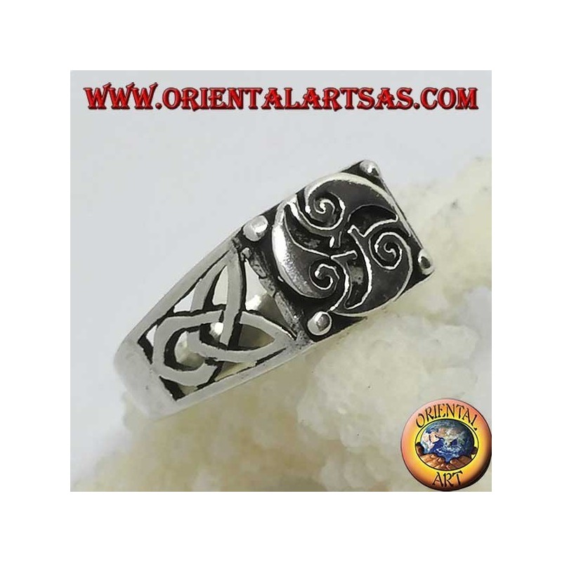 Silver ring with triskele three spirals and Tyrone knots on the sides