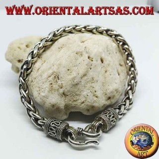 Silver bracelet with intertwined rings, square section