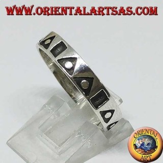 Silver band ring with hollowed triangles and squares