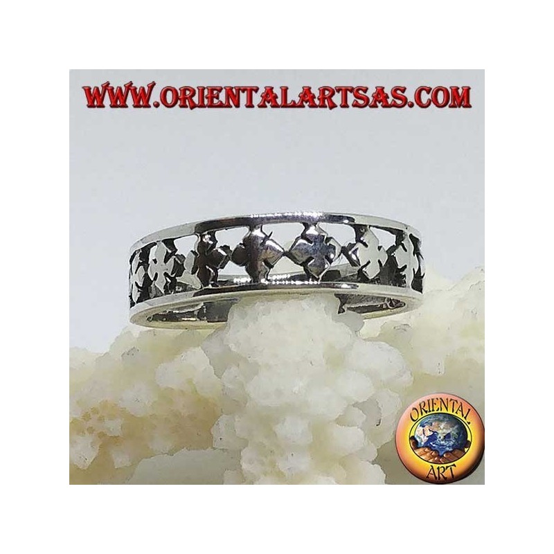 Silver band ring with carved stylized four-leaf clovers