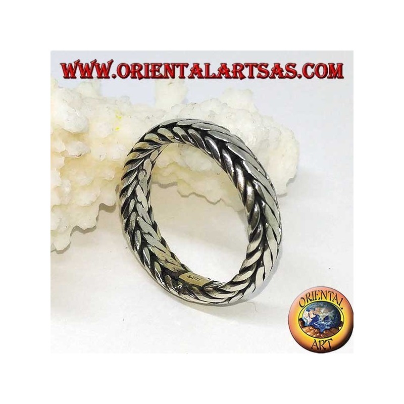 Silver ring with hand-woven band