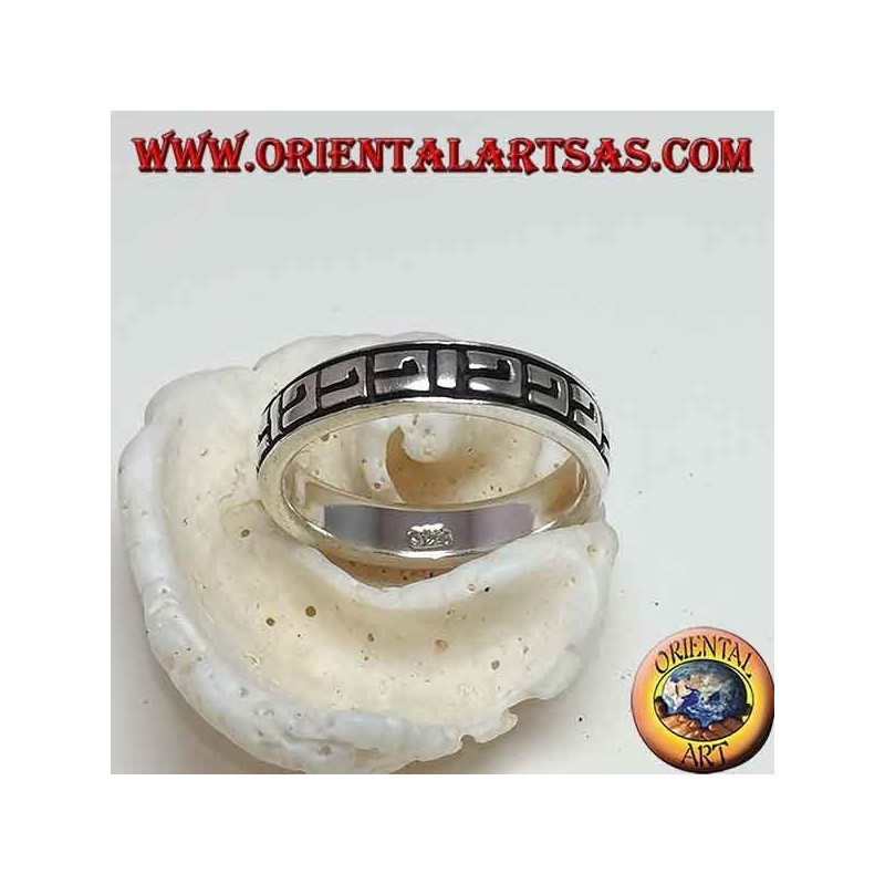 Silver band ring with Greek bas-relief decorations