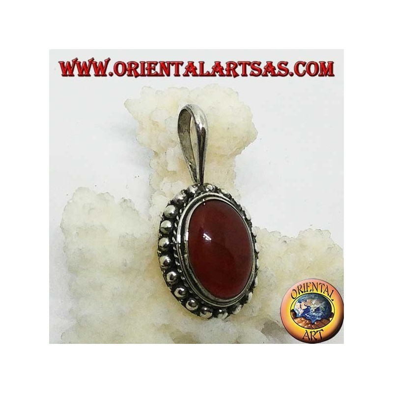 Silver pendant with oval carnelian and border with dots