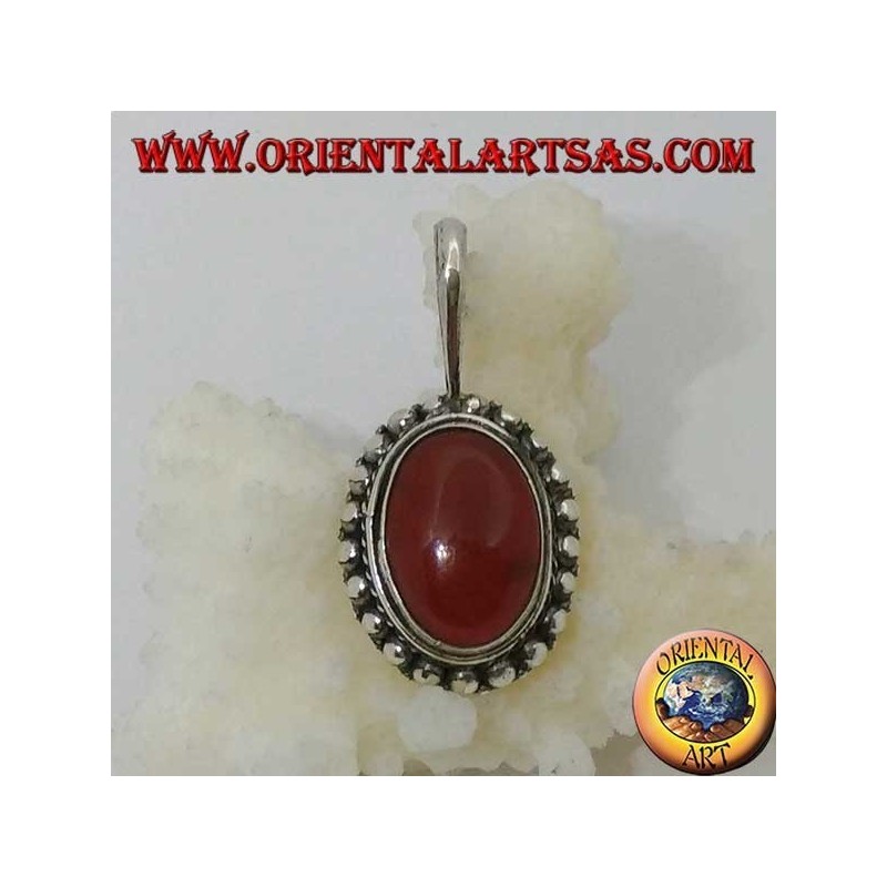 Silver pendant with oval carnelian and border with dots