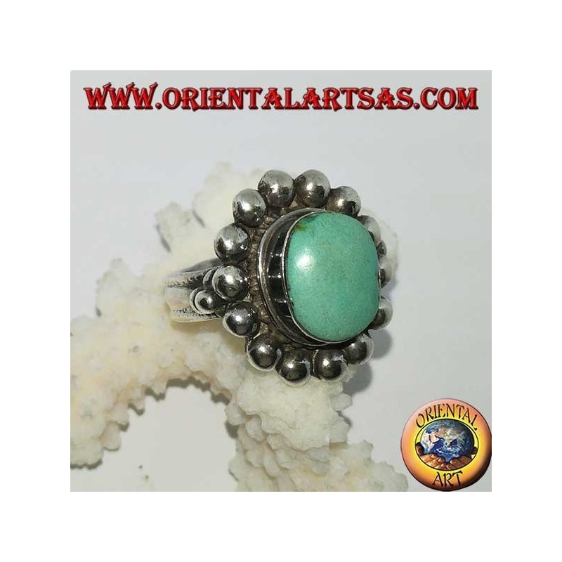 Bague en argent avec ovale turquoise antique tibétain bordé d'hémisphères