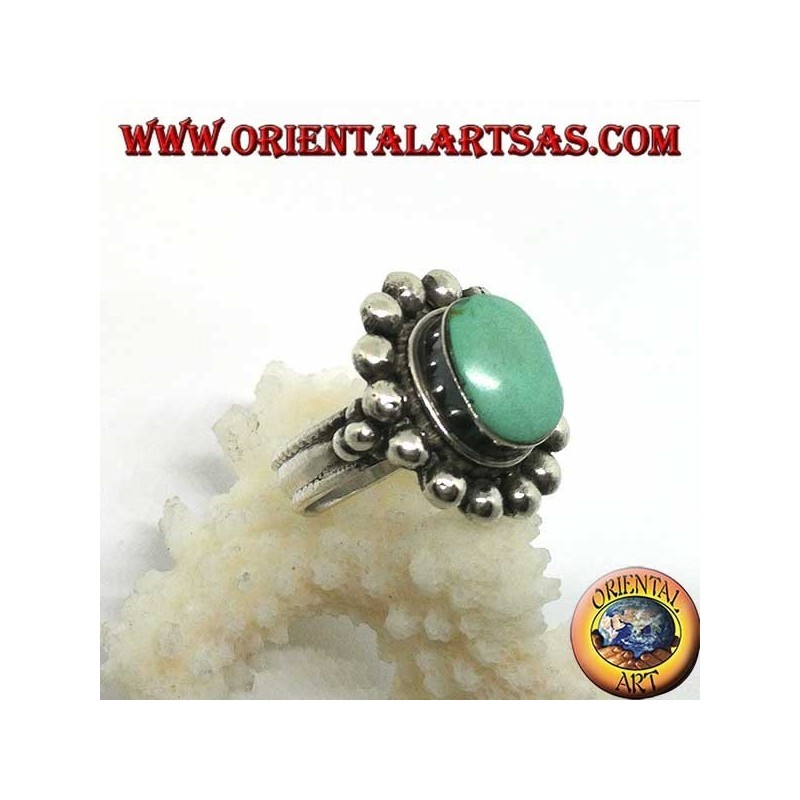 Bague en argent avec ovale turquoise antique tibétain bordé d'hémisphères