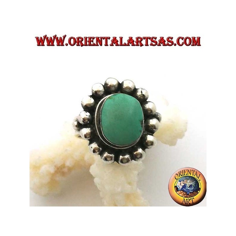 Anello in argento con turchese antico tibetano ovale contornato di semisfere