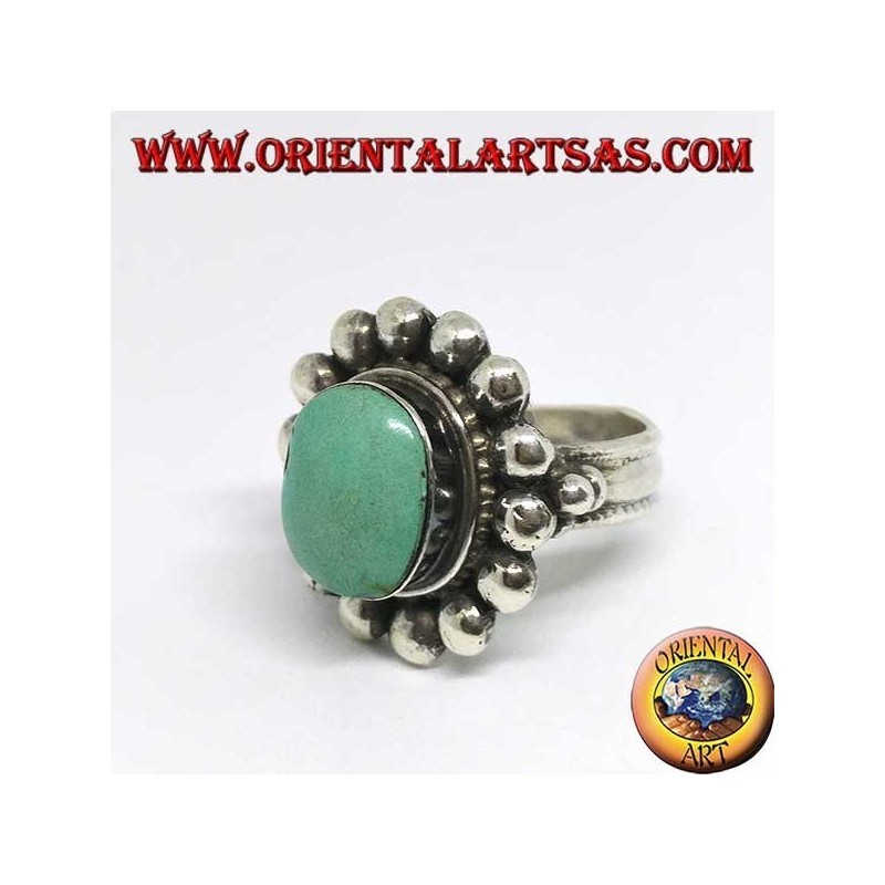 Bague en argent avec ovale turquoise antique tibétain bordé d'hémisphères