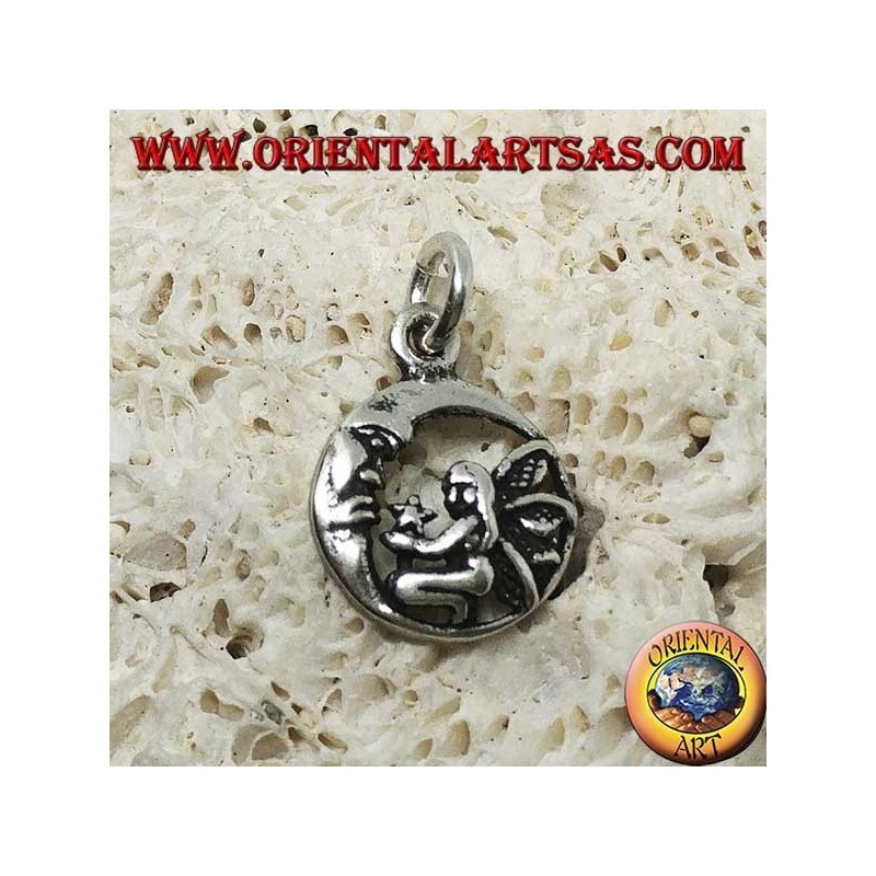 Silver fairy on her knees pendant that gives the star to the moon