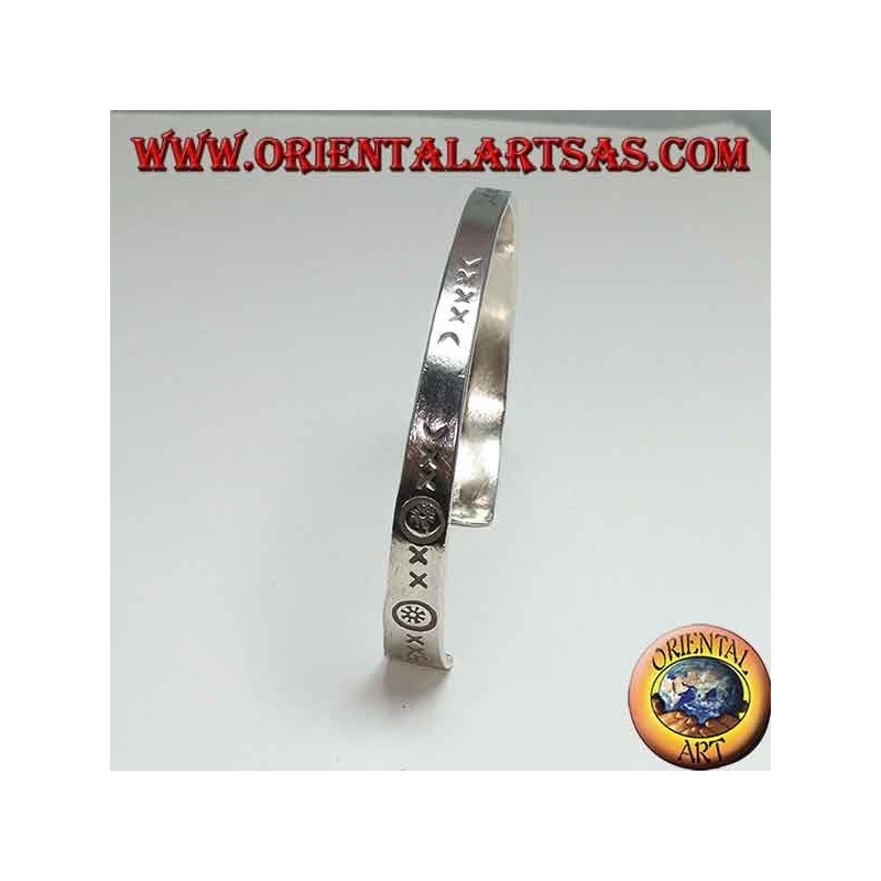 Flat rigid silver hand-engraved bracelet with wider end