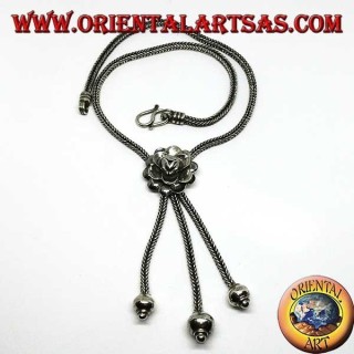 Silver necklace with rose and three tufts with spheres