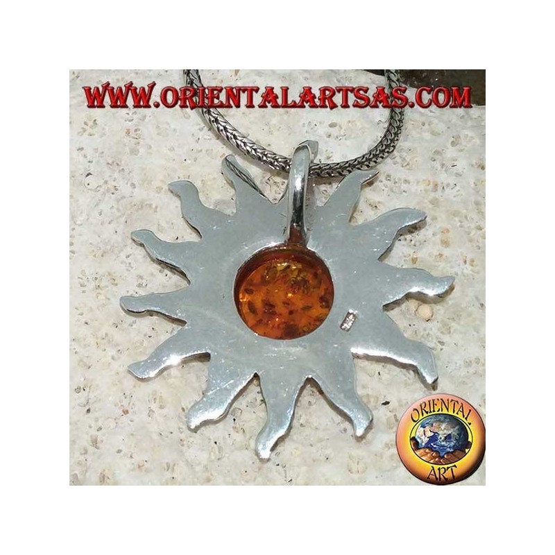 Pendant in silver sun with rays and hemispherical Amber in the center