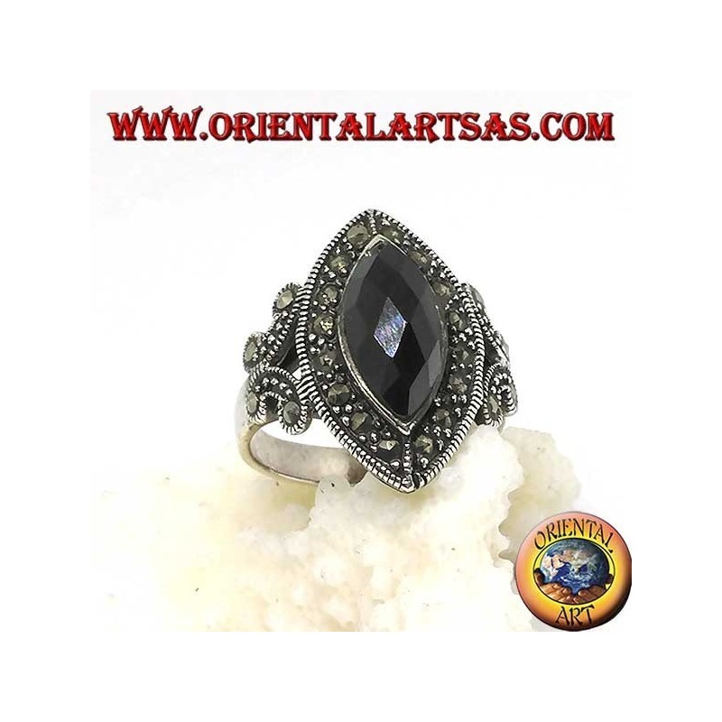 Silver ring with faceted shuttle onyx surrounded by marcasite