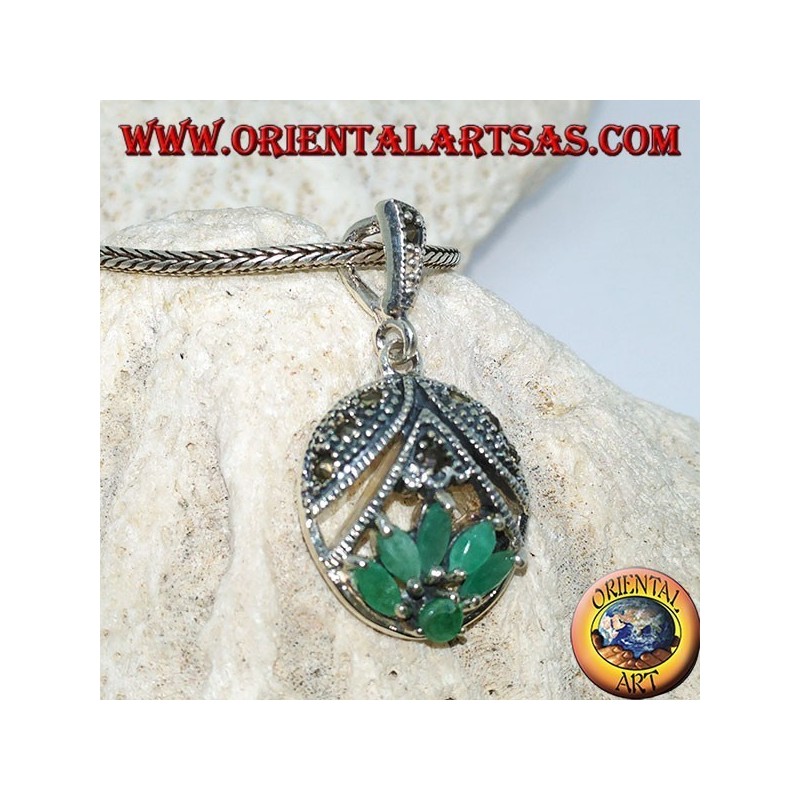 Lotus flower silver pendant with 5 shuttle emeralds and 1 round