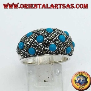 Anillo de plata con banda curva con diez turquesas esféricas rematadas con marcasita