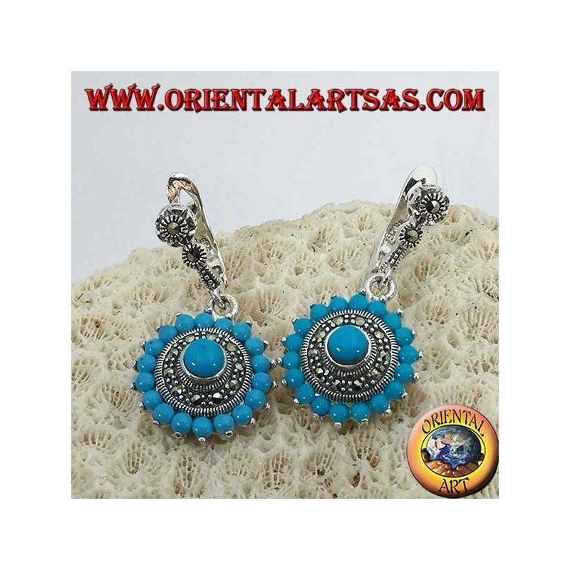 Pendientes redondos de plata, con 18 + 1 turquesa y rodeados de marcasitas.