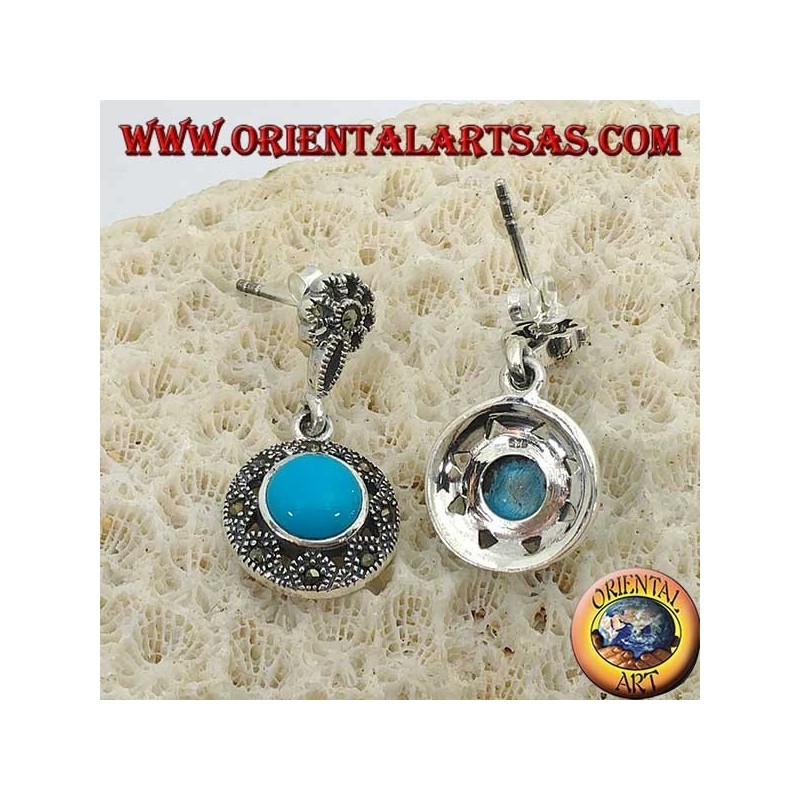 Pendientes redondos de plata colgante, con una turquesa central rodeada de marcasitas.