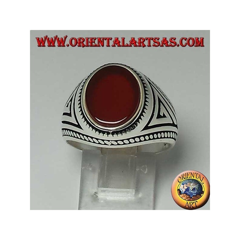 Silver ring with flat oval carnelian with braid at the edges of the ring