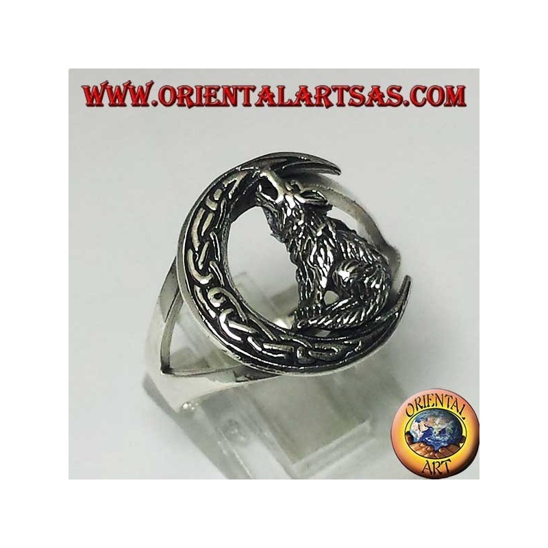 Silver wolf ring howling at the crescent with a Celtic knot