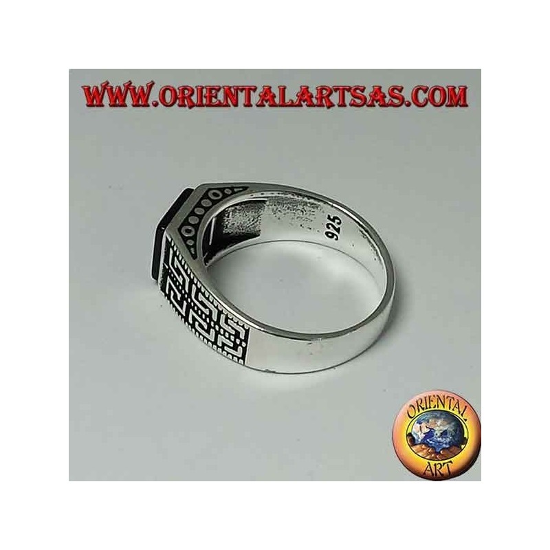 Silver ring with flat square onyx and two rows of Greek on the sides