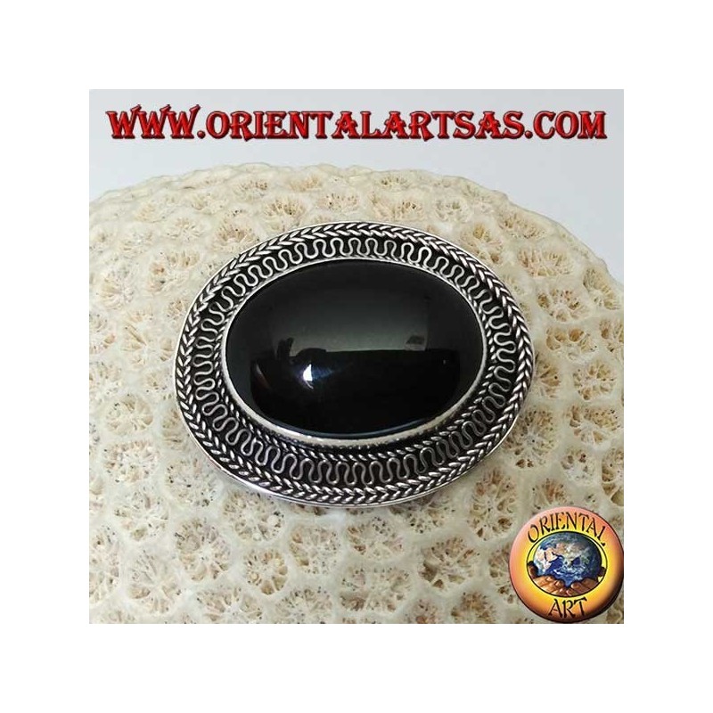 Handmade silver brooch with large oval onyx