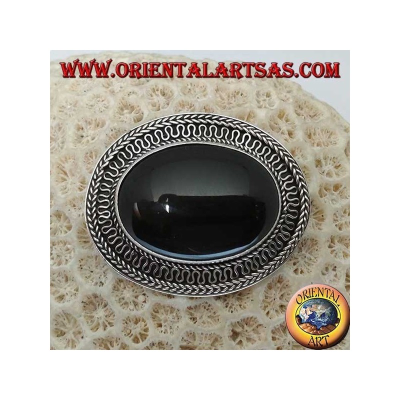 Handmade silver brooch with large oval onyx